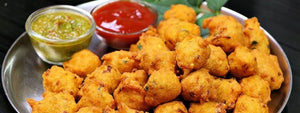 Moong Dal Bhajia: Crispy and golden fritters made from soaked moong dal, perfect for tea-time snacking.