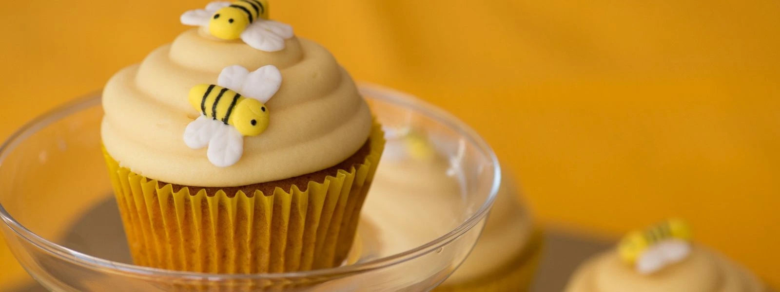 Honey Cupcakes: Light, fluffy cupcakes with a hint of honey, topped with creamy honey buttercream.